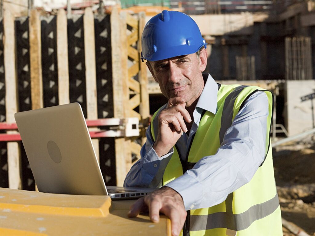 Property professional reviewing plans on a tablet